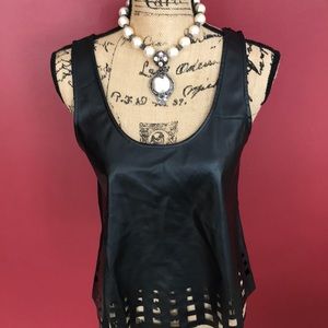Last Kiss black scoop neck look of leather top with peek a boo detailing on hem
